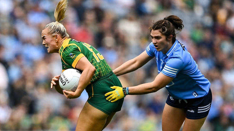 Niamh Collins (R) chases Meath's Vikki Wall in last year's All-Ireland final