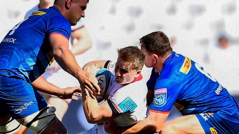 Ulster centre Stewart Moore is closed down by the Stormers defence