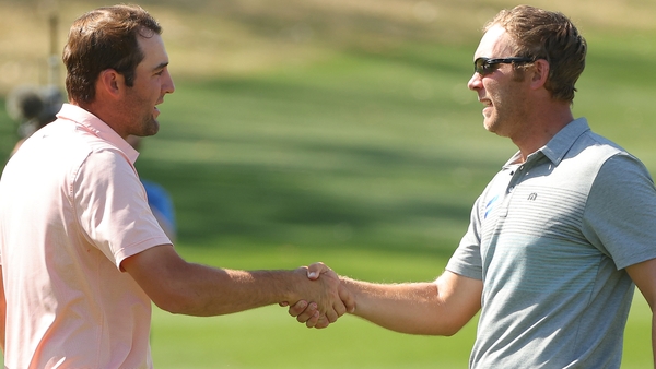 Séamus Power (right) was defeated by Scottie Scheffler in the quarter-finals