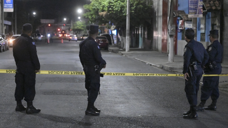 Police cordon off a crime scene in Colón, La Libertad department, El Salvador