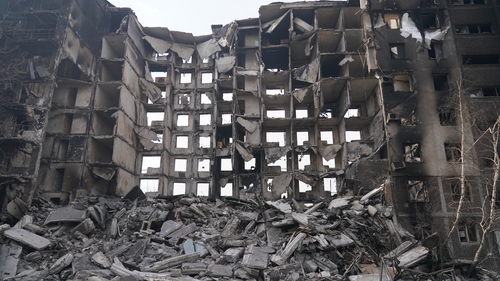Three of the men were accused of stopping civilians from leaving Mariupol last year