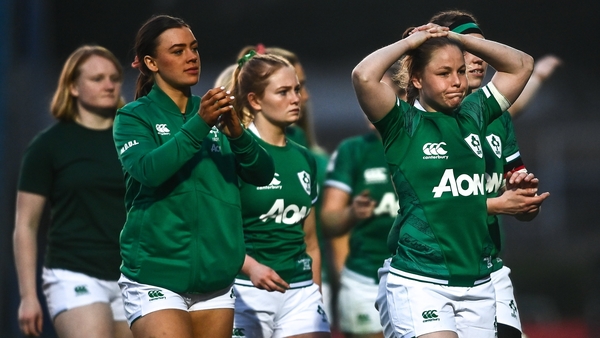 Irish players react to their 27-19 defeat against Wales