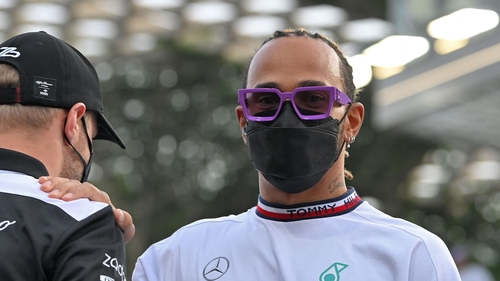 Hamilton speaking with former team-mate Valtteri Bottas (l) during the drivers' parade ahead of the Saudi Arabia Grand Prix last weekend