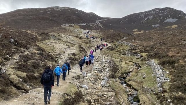 Steady does it - making the trek up 'the Reek'