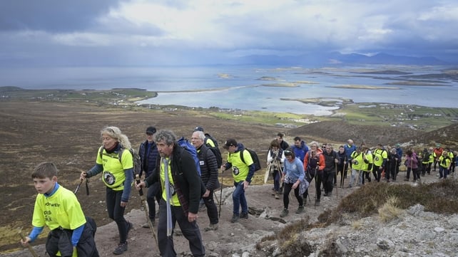 Charlie Bird makes his way up to the summit