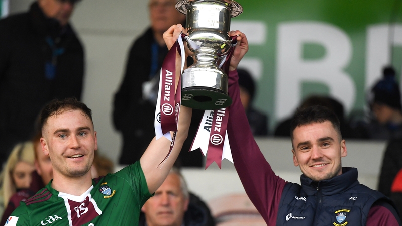 Killian Doyle and Aongus Clarke lift the trophy