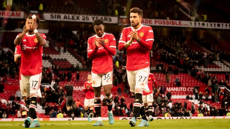 Fred, Anthony Elanga and Alex Telles leave the pitch after the 1-1 draw with Leicester City