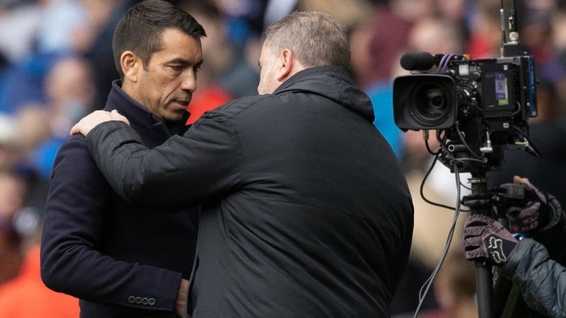 Van Bronckhorst and Postecoglu at the final whistle