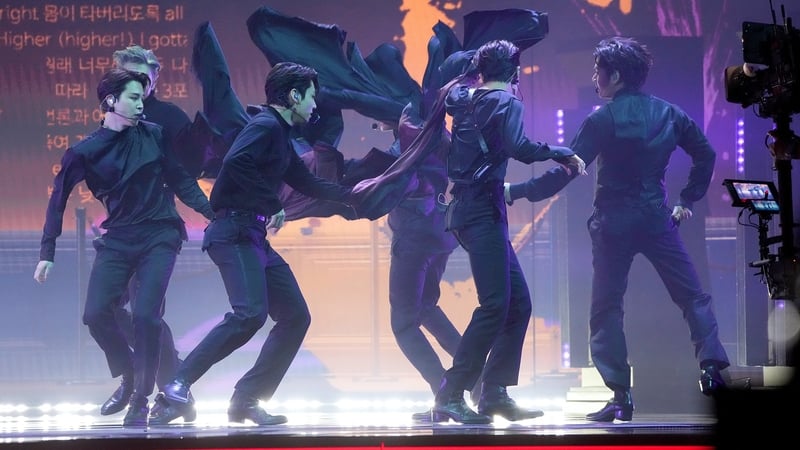 BTS perform onstage during the 64th Annual GRAMMY Awards at MGM Grand Garden Arena. (Photo by Kevin Mazur/Getty Images for The Recording Academy)