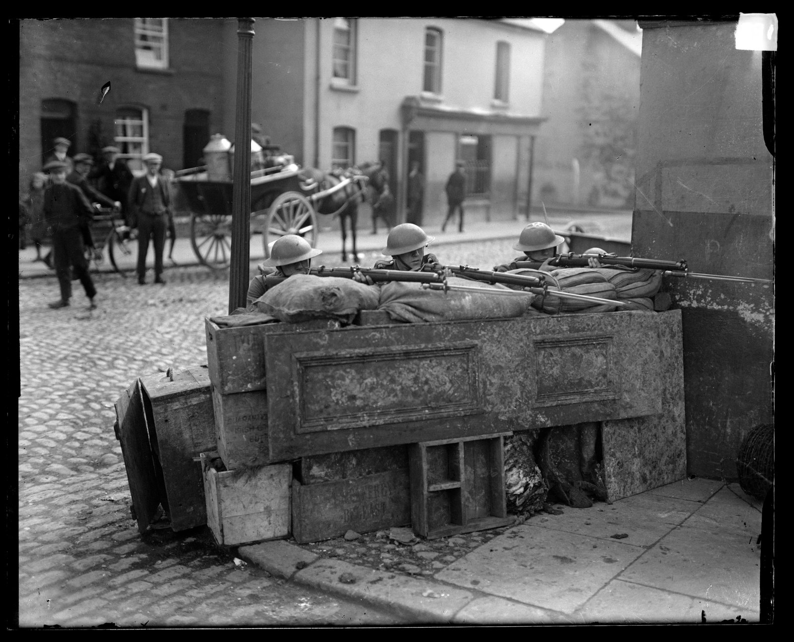 British troops man a barricade in Belfast