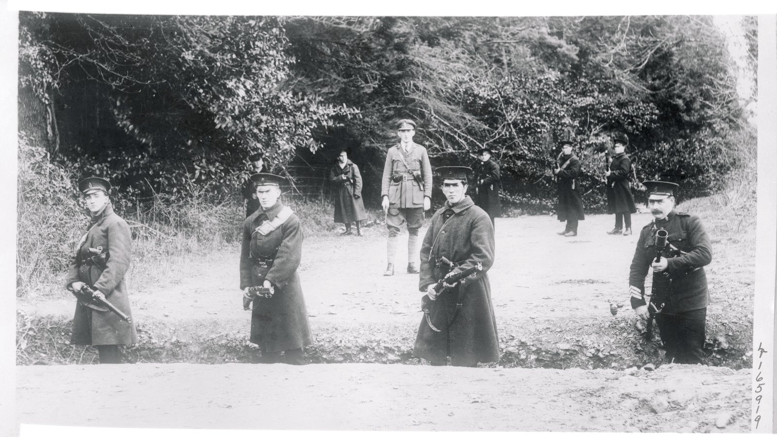 Ulster Special Constables pose in a trench cut across the road at the new Border (Getty Images)