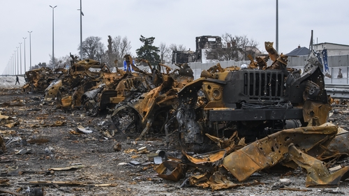 Destroyed Russian military vehicles on a road near Kyiv