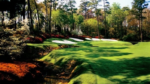 The 13th green from Rae's Creek with Azaleas blooming at Augusta National Golf Club