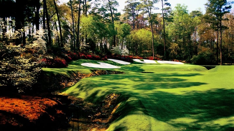 The 13th green from Rae's Creek with Azaleas blooming at Augusta National Golf Club