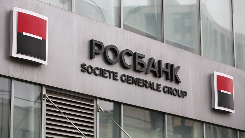 A SocGen Group logo stands on display outside a Rosbank bank branch in Moscow