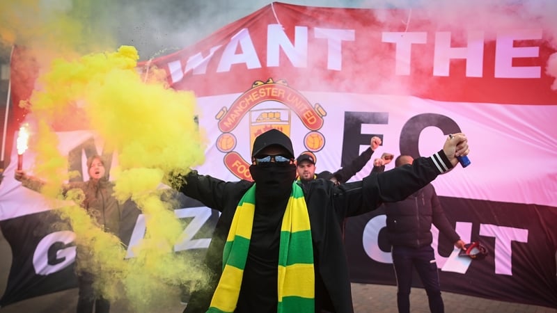 Fans are seen protesting Manchester United's Glazer ownership last year