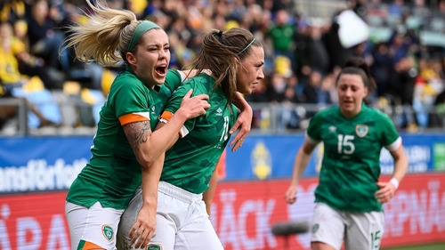 Denise O'Sullivan (L) celebrates with Katie McCabe
