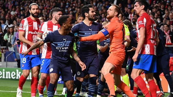 İlkay Gundogan and Raheem Sterling of Manchester City clash with Jan Oblak and Stefan Savic