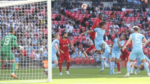Ibrahima Konate heads home the opener