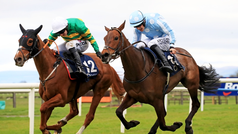 Mark Walsh onboard Glan leads home Heia ridden by Brian Hayes