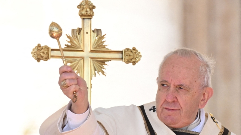 Pope Francis blesses attendees during the Easter mass at Peter's square in The Vatican