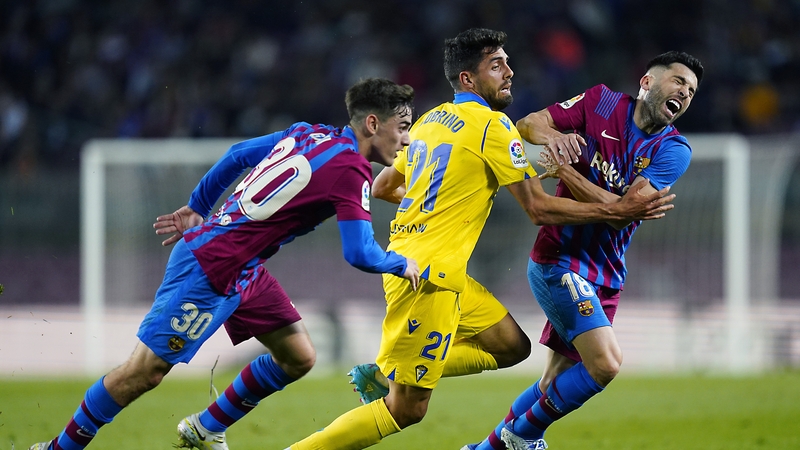 Jordi Alba of FC Barcelona and Ruben Sobrino of Cadiz