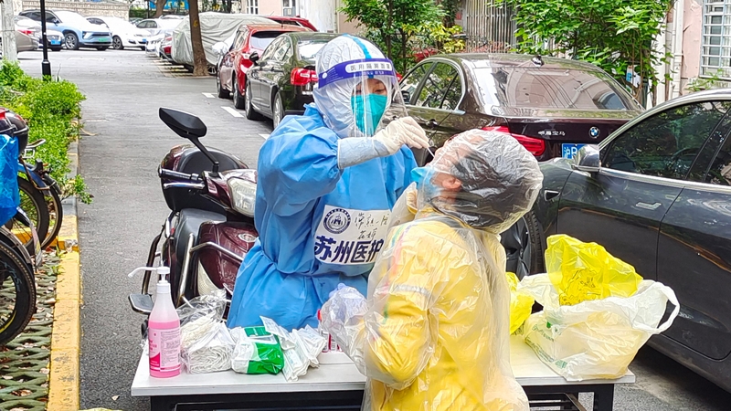 China has instituted a policy of hard lockdowns and mass testing to try to stop the spread of Covid-19