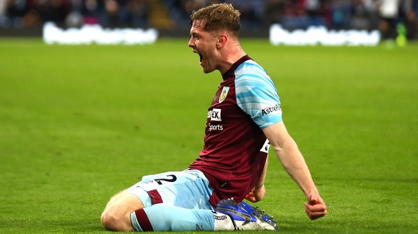 Nathan Collins celebrates after heading home Burnley's second from a corner