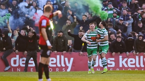 Andy Lyons celebrates his opener with Richie Towell