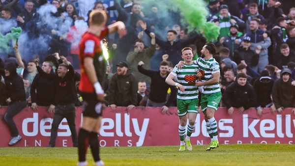 Andy Lyons celebrates his opener with Richie Towell