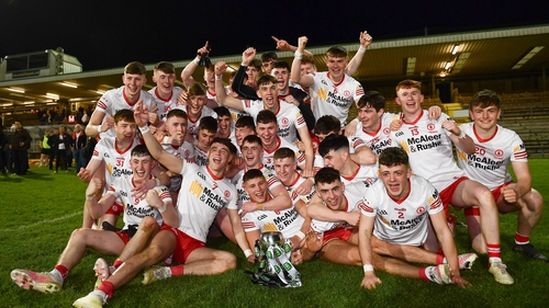 Tyrone players celebrate with the cup after their record 15th Ulster title at U20/21 level