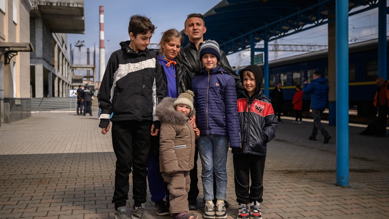 Yevgen and Tetiana with their four children prior to boarding an evacuation train to Lviv