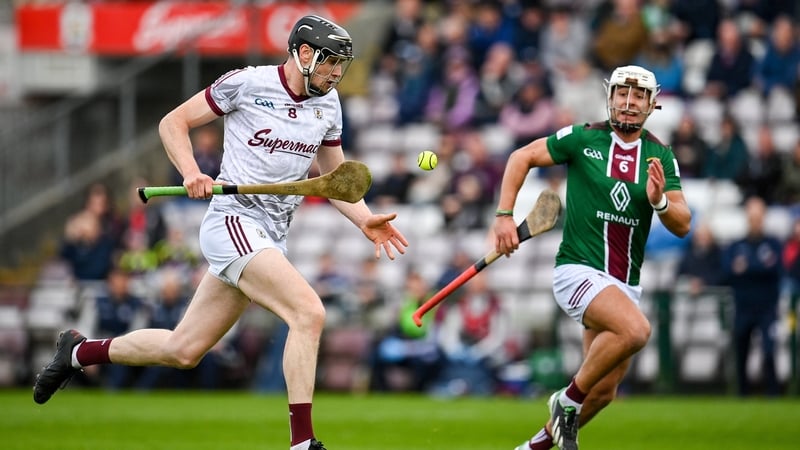 Galway's Joseph Cooney is tracked by Robbie Greville of Westmeath