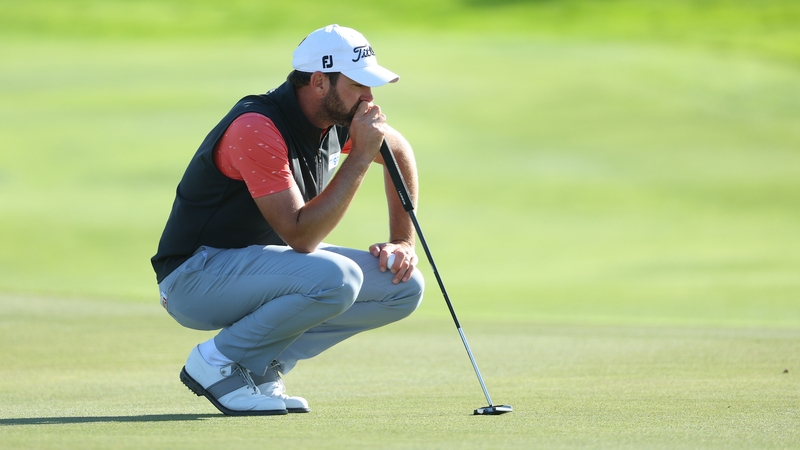 Scott Jamieson lines up a putt on the first ole