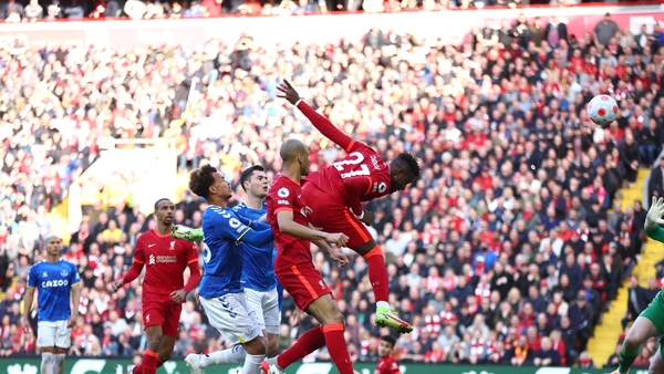 Divock Origi heads home Liverpool's second