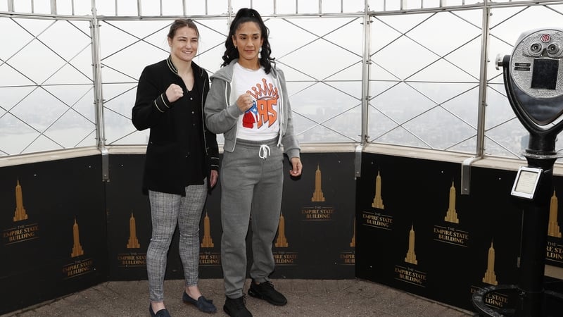 Katie Taylor and Amanda Serrano pose for a photo at the Empire State Building