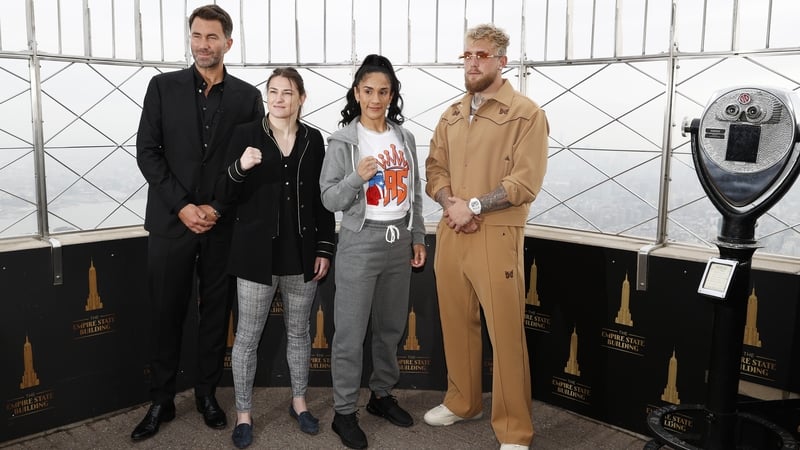 Eddie Hearn with his fighter Katie Taylor and opponent and promoter Amanda Serrano and Jake Paul at the Empire State Building