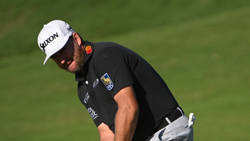 Graeme McDowell plays a shot on the 12th hole during the second round