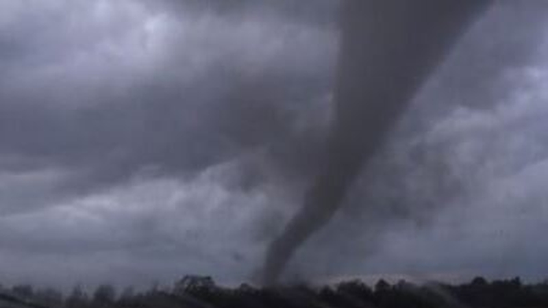 What started as a funnel, eventually touched down as a small rope tornado near Andover last night