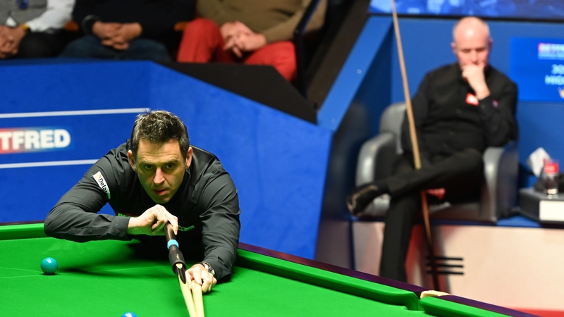 Ronnie O'Sullivan in action against John Higgins