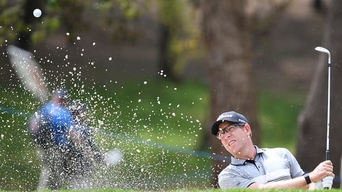 Oliver Bekker plays his third shot on the 12th hole
