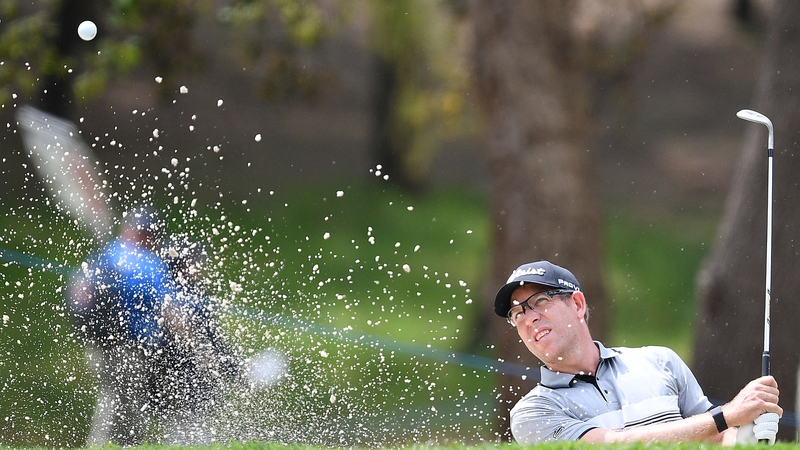 Oliver Bekker plays his third shot on the 12th hole