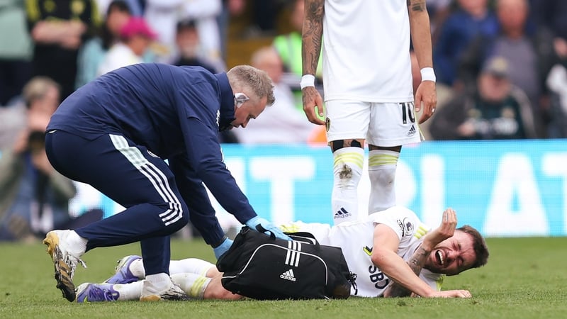 Stuart Dallas receives treatment at Elland Road