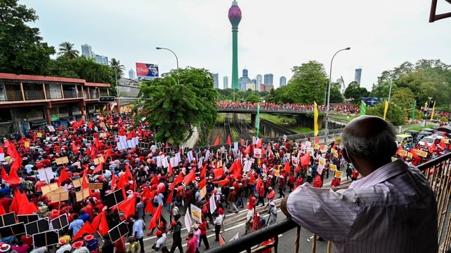 Activists in Sri Lanka supporting the People's Liberation Front party take part in a May Day rally in Colombo