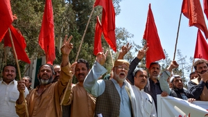 Activists in Pakistan shout slogans in support of the Labour Union