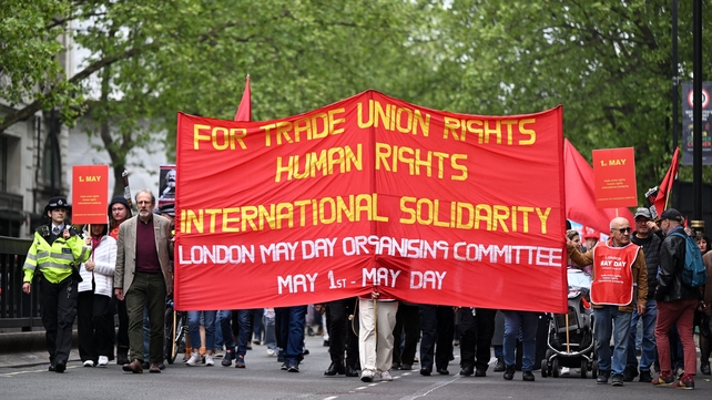 Protesters taking part in a May Day march in London