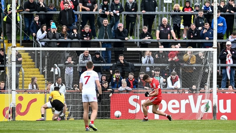 Derry forward Shane McGuigan tucks away his first-half penalty against Tyrone