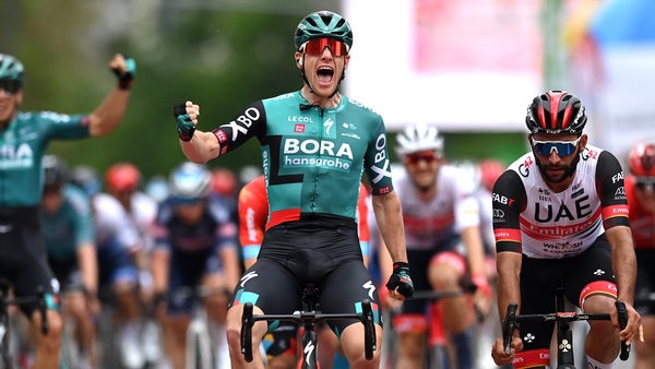 Sam Bennett celebrates as he crosses the line first in Frankfurt