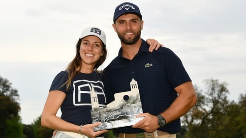 Adri Arnaus poses with girlfriend Cristina Casanella after winning the Catalunya Championship