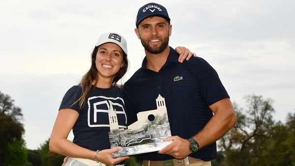 Adri Arnaus poses with girlfriend Cristina Casanella after winning the Catalunya Championship